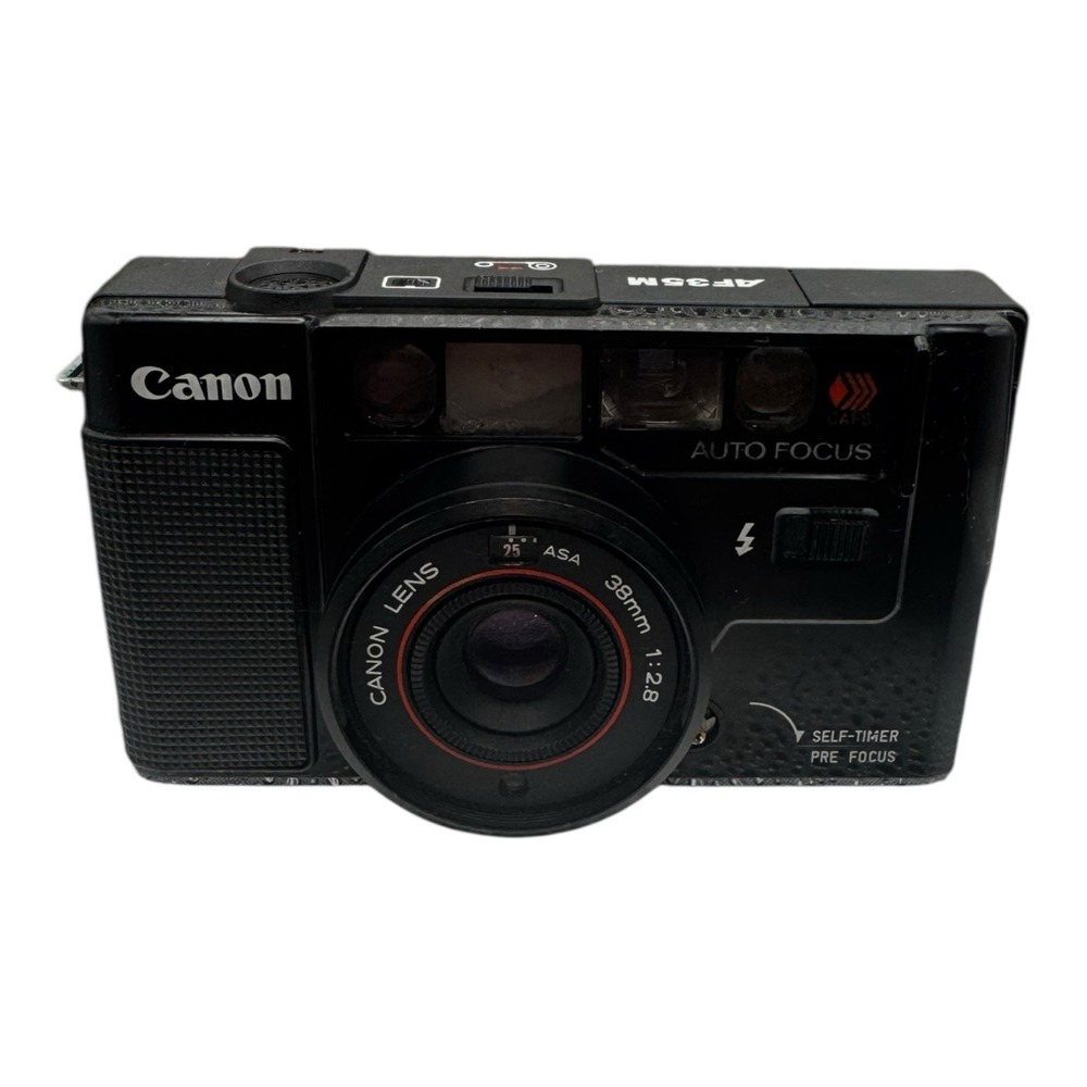 Canon T50 35mm Film SLR Camera Body Only For Parts. Not Tested